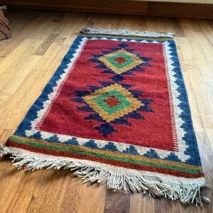 Neverused handwoven wool rug